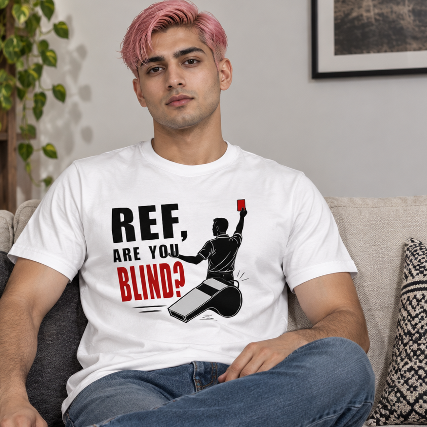Man on a sofa wearing the white Ref, Are You Blind? t-shirt with a referee showing a red card