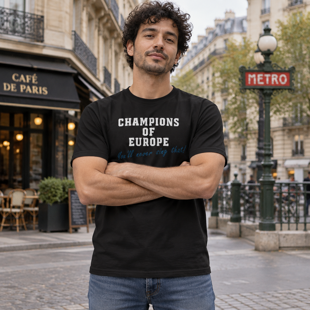 Man on a Paris street wearing the black Champions of Europe t-shirt with white lettering and blue script
