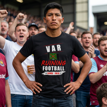 Fan among celebrating supporters wearing the black VAR Ruining Football t-shirt with red and white print
