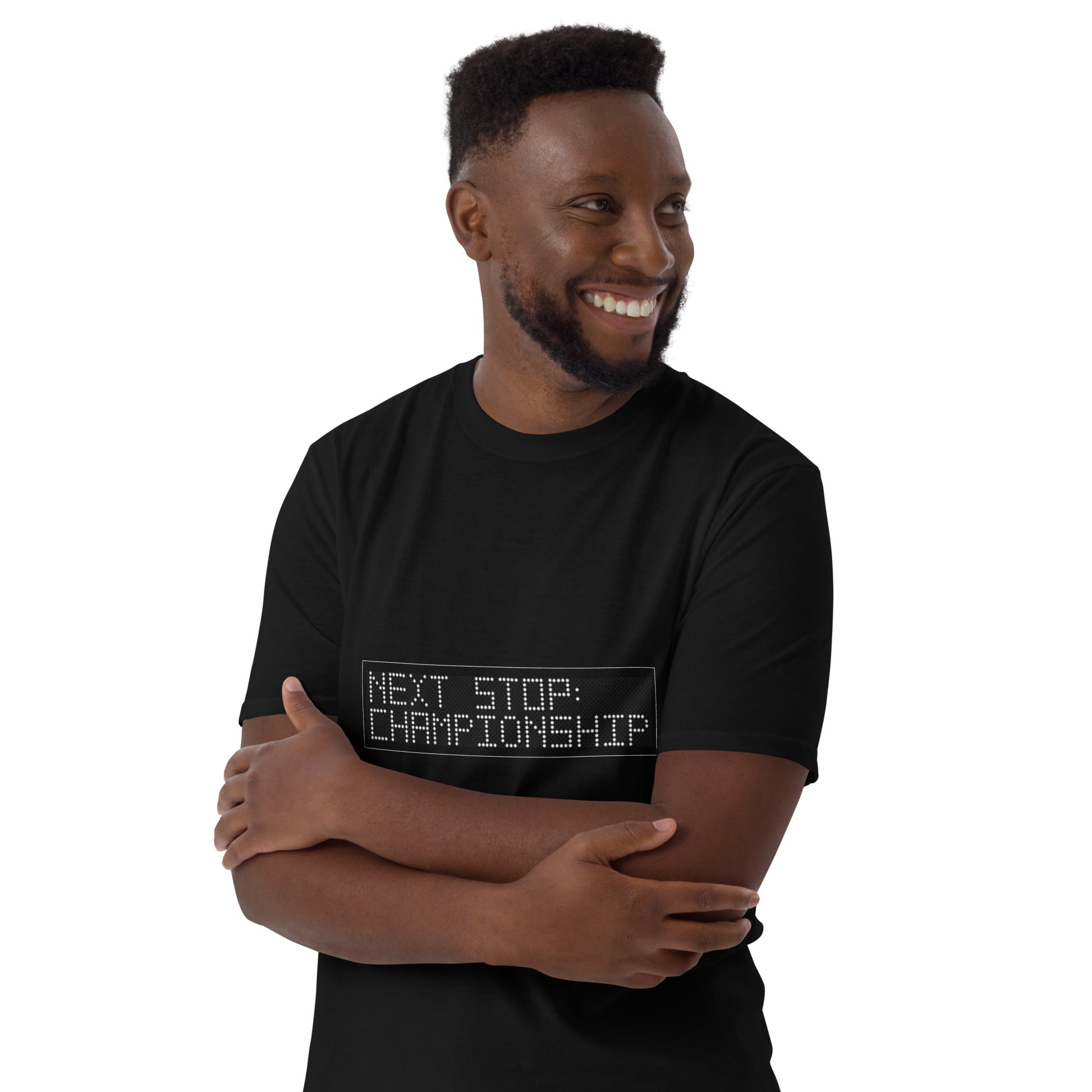 Man wearing a black short sleeve t-shirt with 'Next Stop: Championship' text on a white background with a happy face.