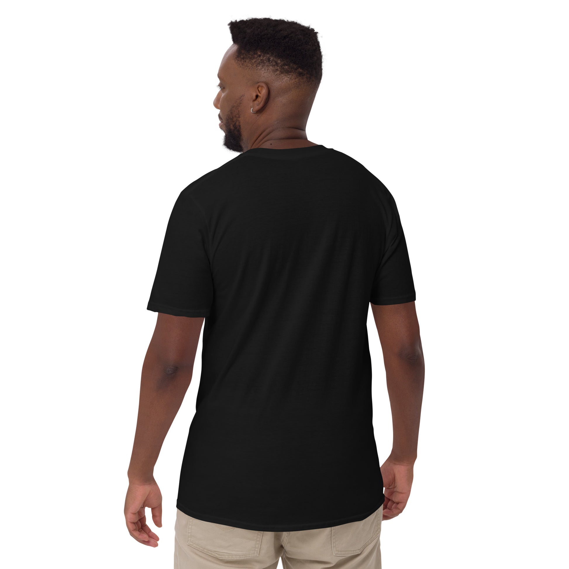 Man wearing a black t-shir from the back on a white background, on the front it says next stop Championship