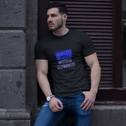 Man wearing a black t-shirt with text saying going down with a football league table leaning against a wall.
